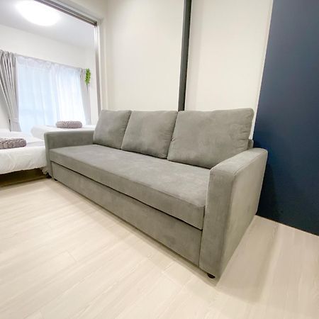 Residential Hotel Glitter Usjまで1駅5分 أوساكا المظهر الخارجي الصورة