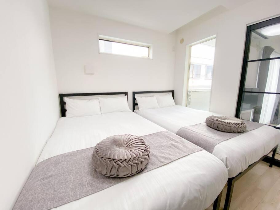 Residential Hotel Glitter Usjまで1駅5分 أوساكا المظهر الخارجي الصورة