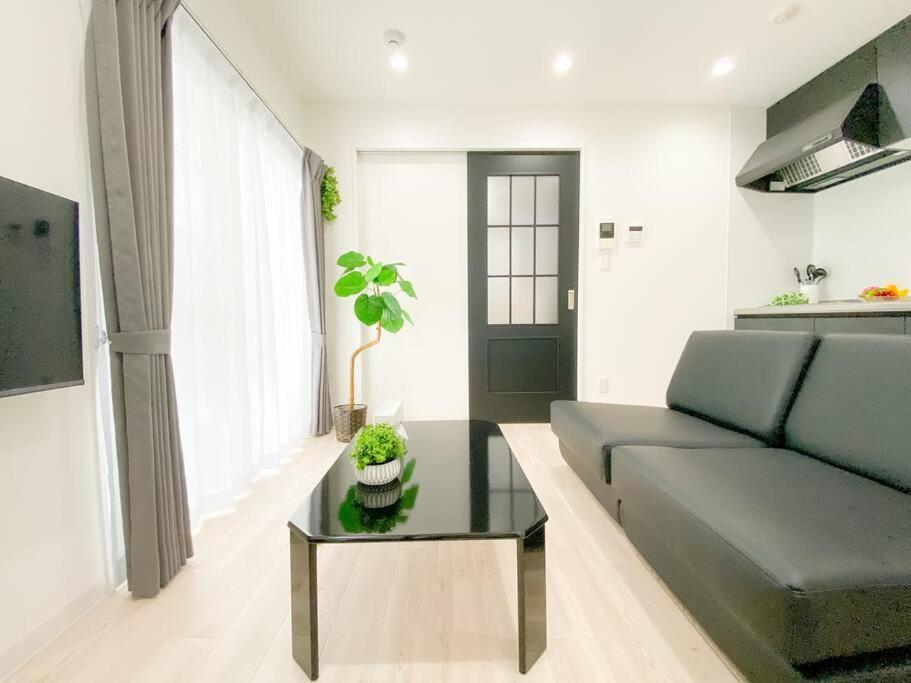Residential Hotel Glitter Usjまで1駅5分 أوساكا الغرفة الصورة