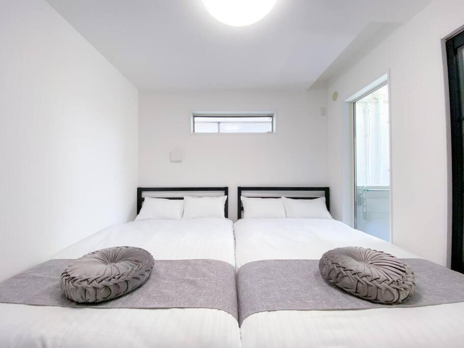 Residential Hotel Glitter Usjまで1駅5分 أوساكا المظهر الخارجي الصورة
