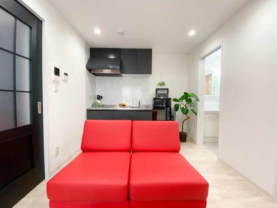 Residential Hotel Glitter Usjまで1駅5分 أوساكا الغرفة الصورة