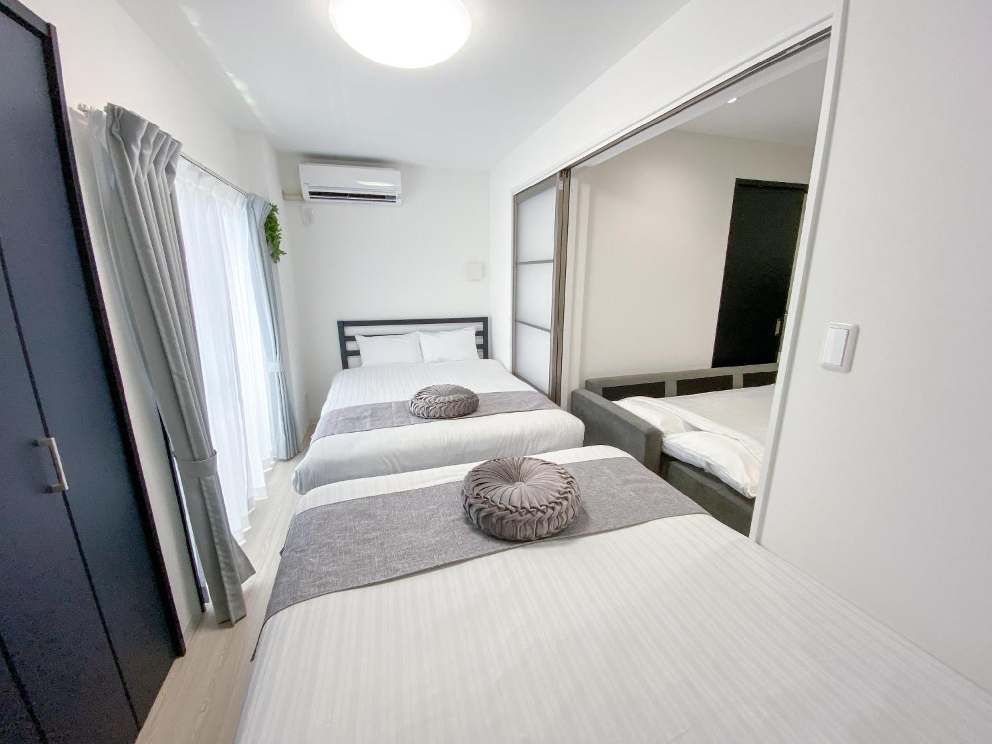 Residential Hotel Glitter Usjまで1駅5分 أوساكا الغرفة الصورة