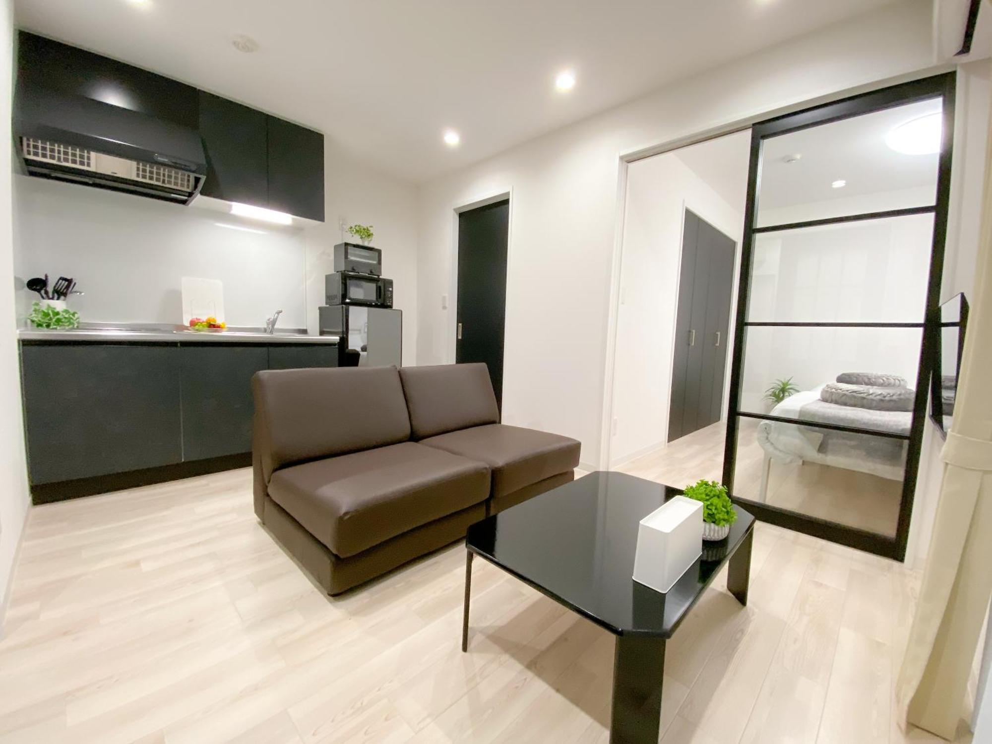 Residential Hotel Glitter Usjまで1駅5分 أوساكا المظهر الخارجي الصورة