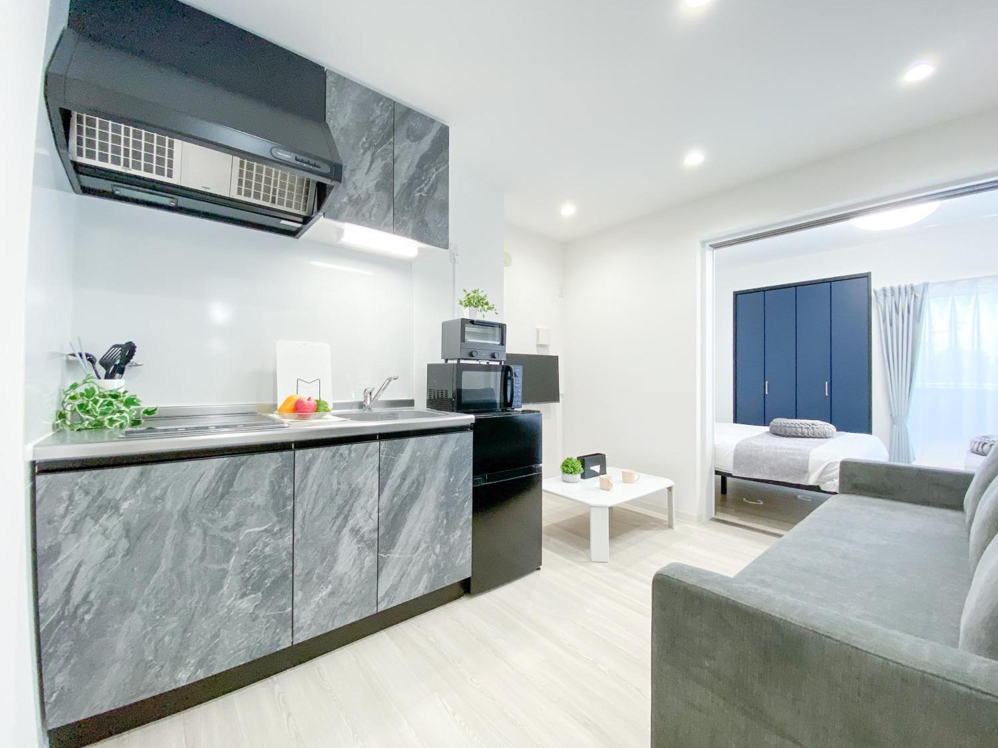 Residential Hotel Glitter Usjまで1駅5分 أوساكا المظهر الخارجي الصورة