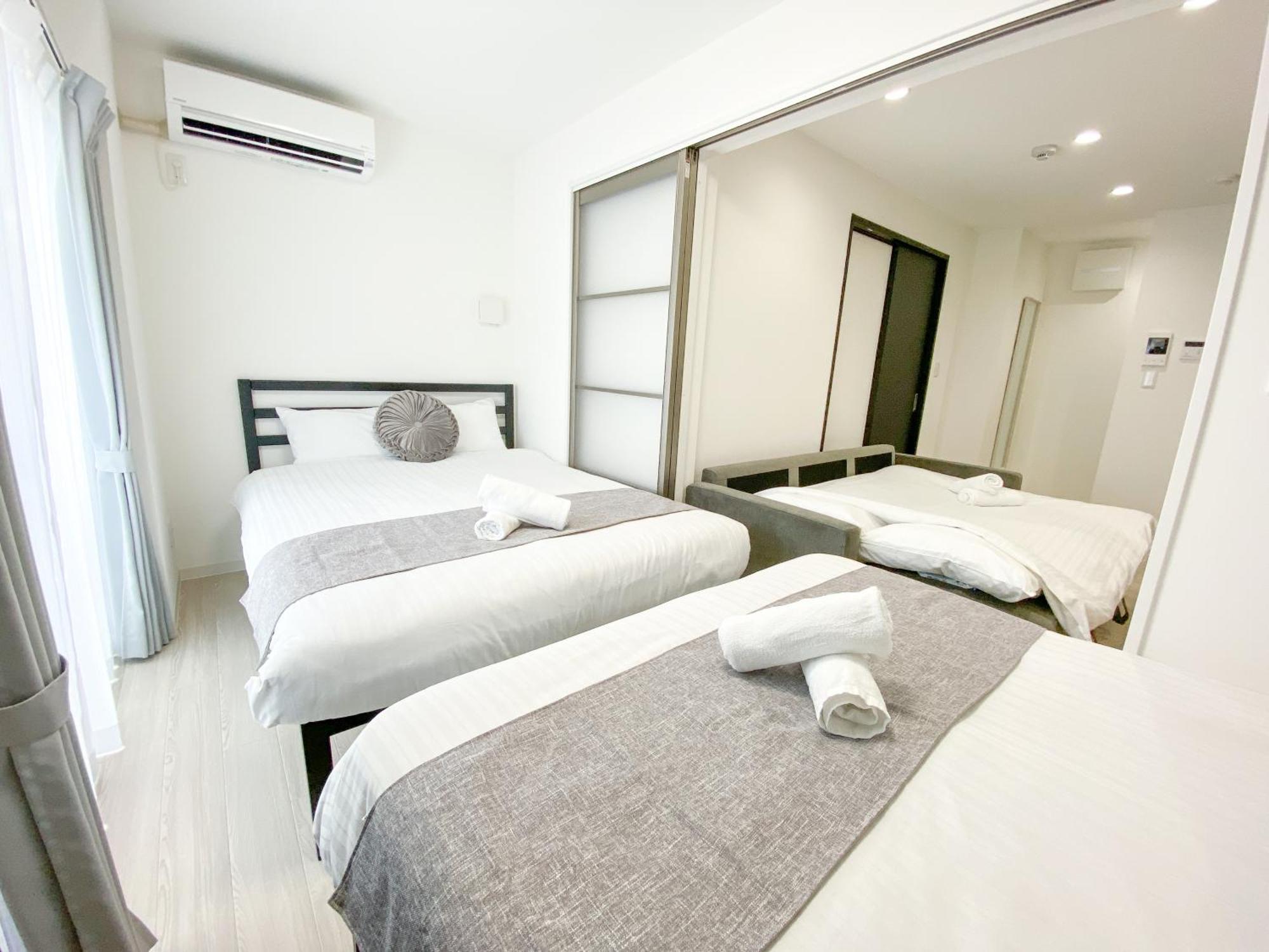 Residential Hotel Glitter Usjまで1駅5分 أوساكا الغرفة الصورة